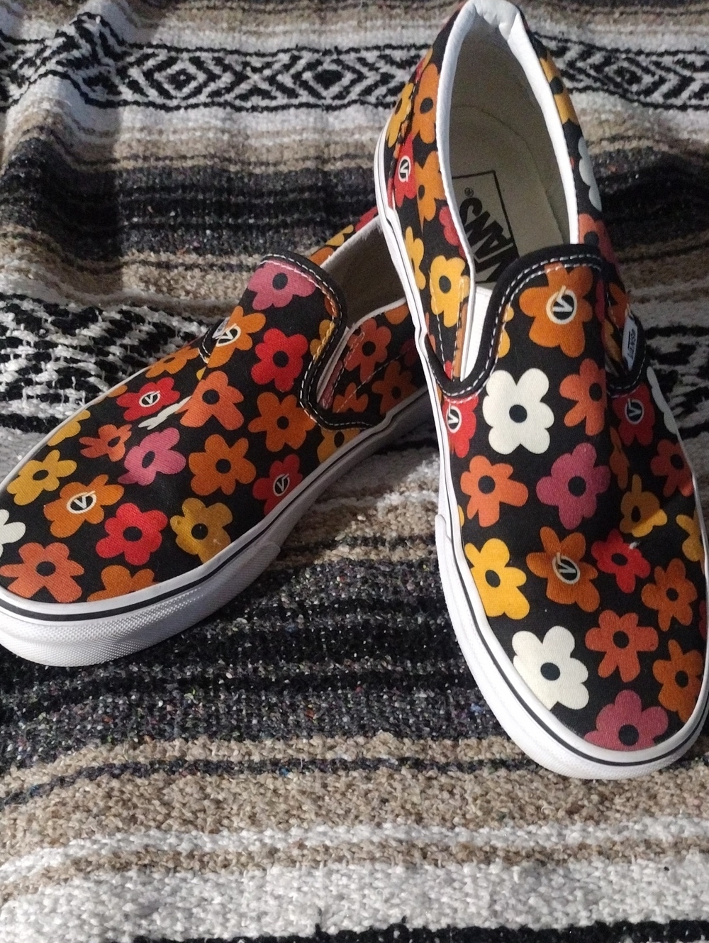 Vans Slip-On Sneakers in Black with Orange, Yellow, Pink & Cream Floral Print